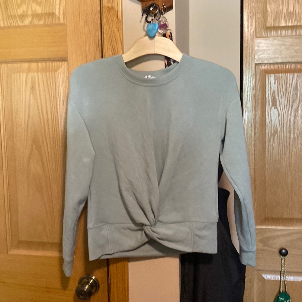 Women’s light green sweater
